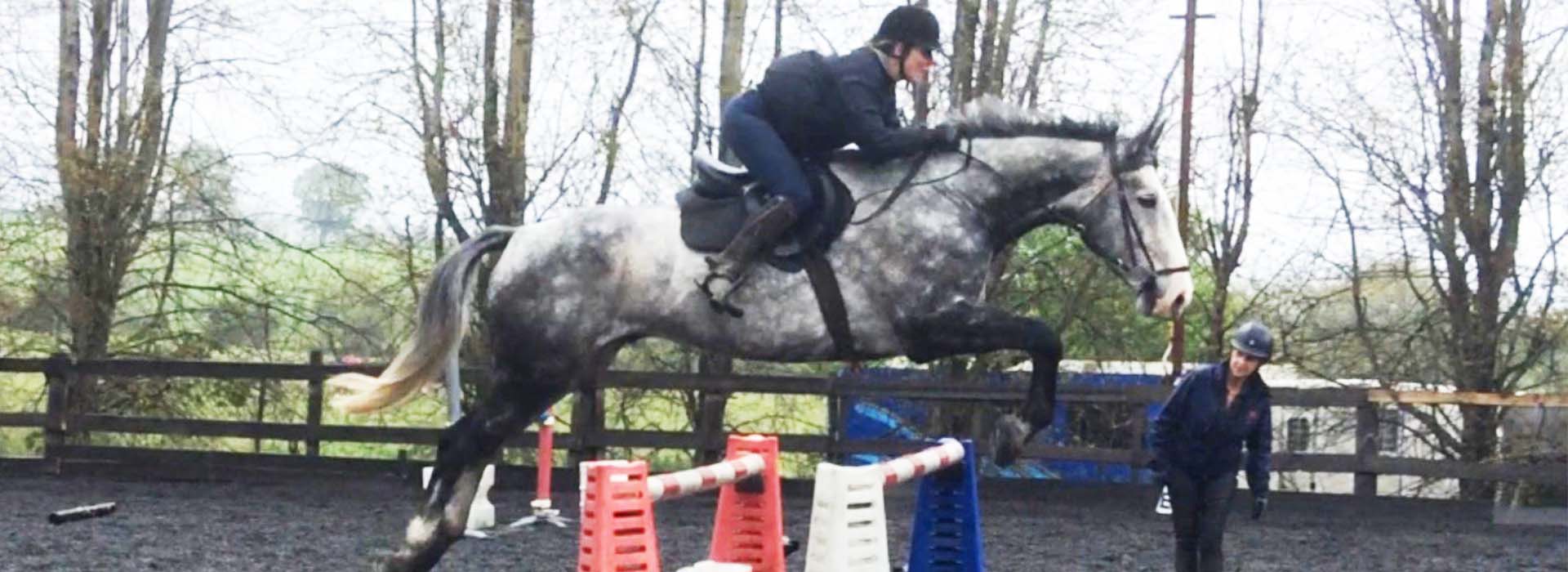 A horse jump training with Fiona Stuart at Tullochan training yard near Glasgow