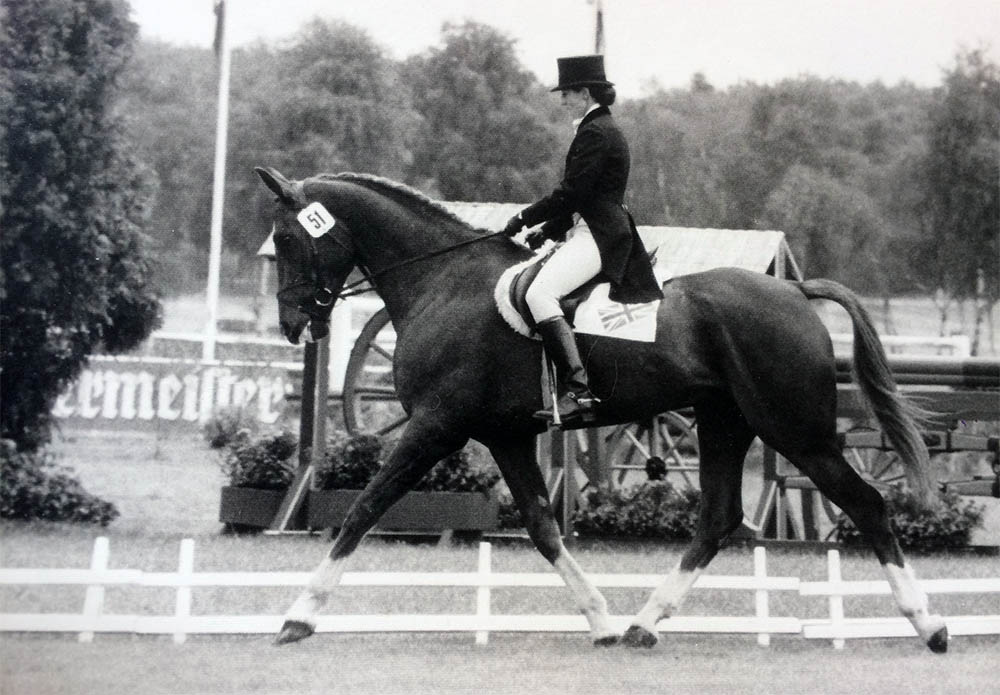 Fiona Stuart competing on her horse in a dressage event